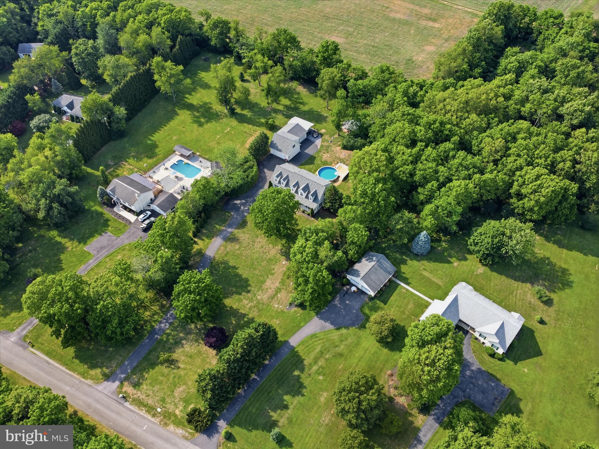 726 Doe Run Road Inwood, WV 25428 - Photo 67 of 68 an aerial view of a house with yard swimming pool and outdoor seating