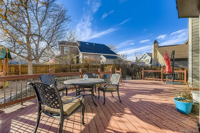 a view of a yard with a fire pit and a fire pit