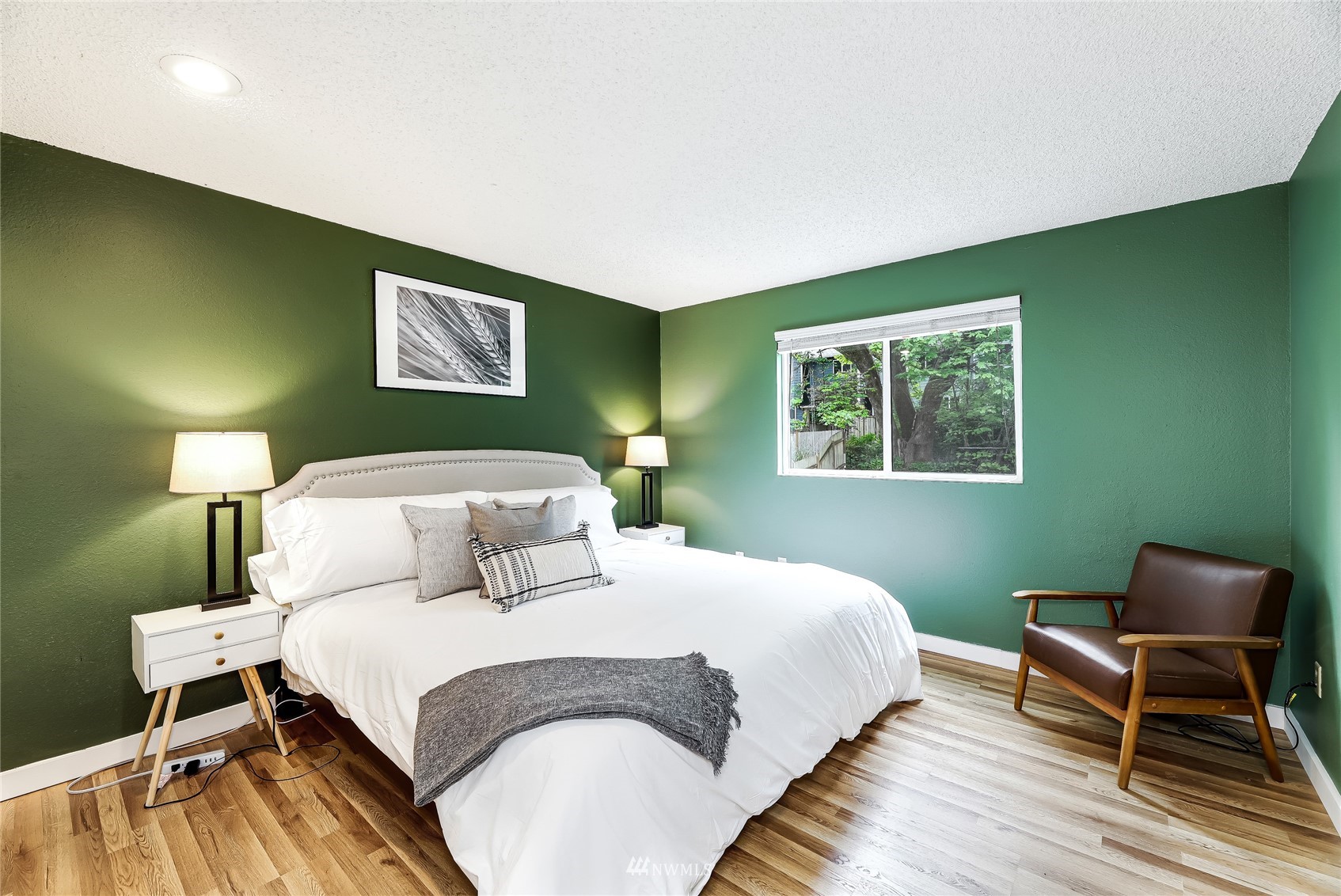 17818 Brook Boulevard Bothell, WA 98012 - Photo 11 of 27 a bedroom with a bed and a window