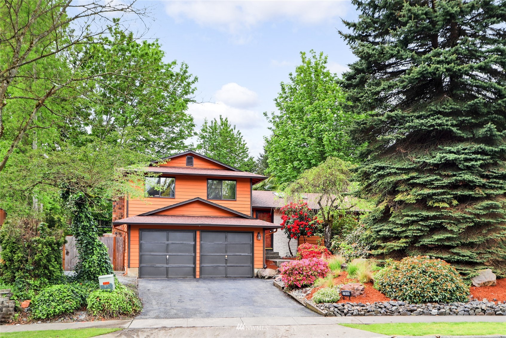 17818 Brook Boulevard Bothell, WA 98012 - Photo 2 of 27 front view of a house with a yard