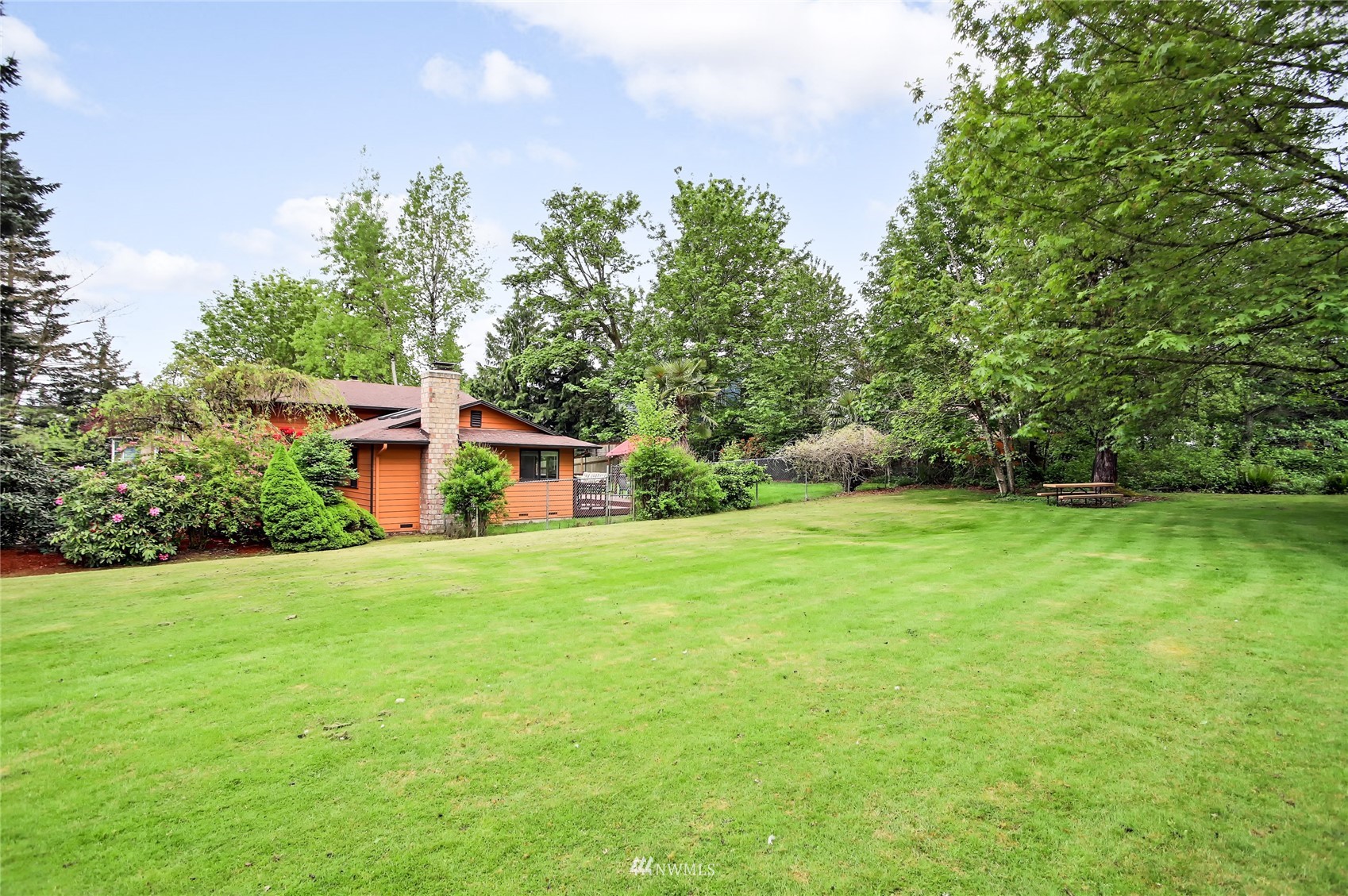 17818 Brook Boulevard Bothell, WA 98012 - Photo 24 of 27 a house with garden in front of it