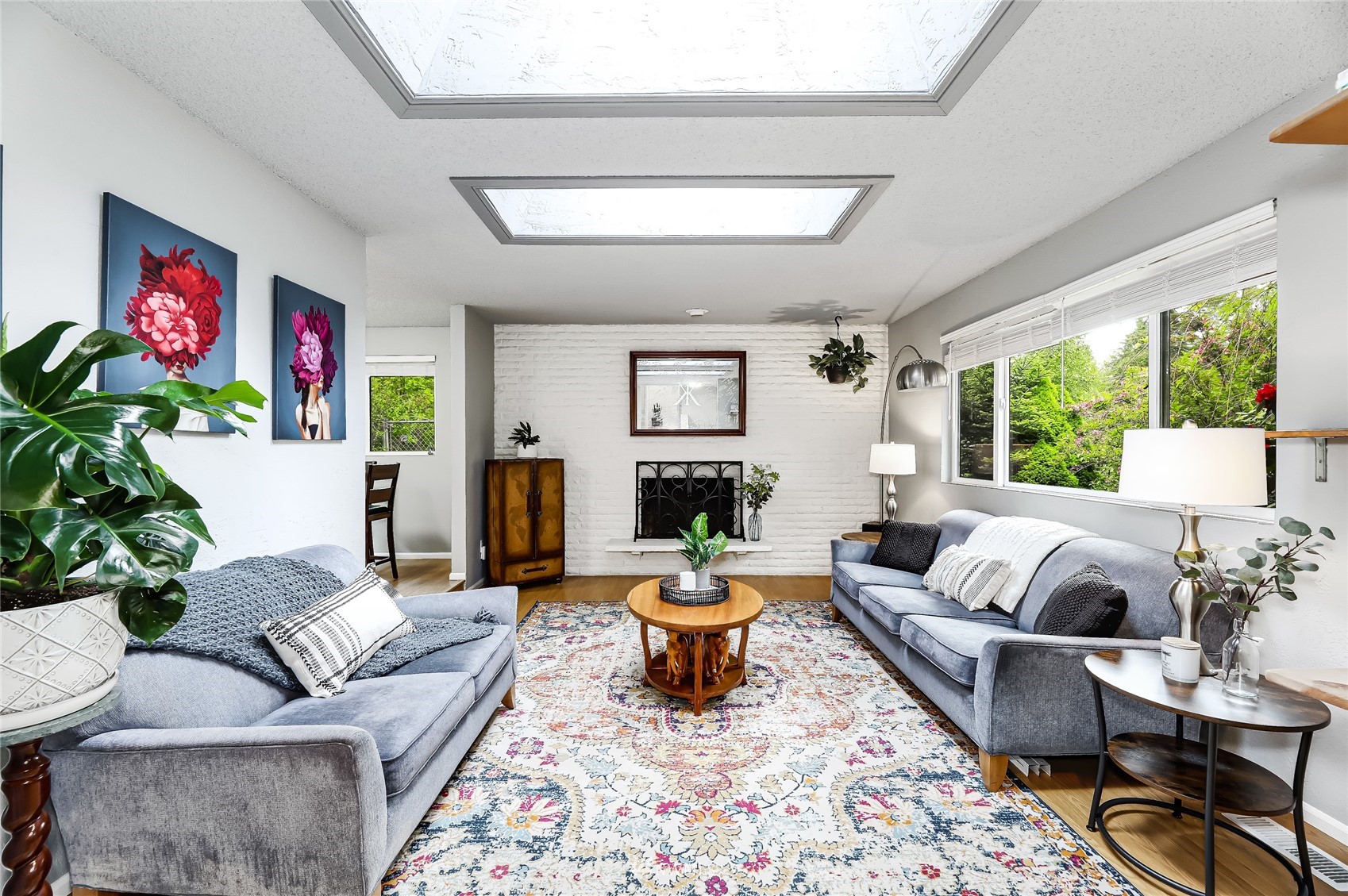 17818 Brook Boulevard Bothell, WA 98012 - Photo 6 of 27 a living room with furniture and a large window