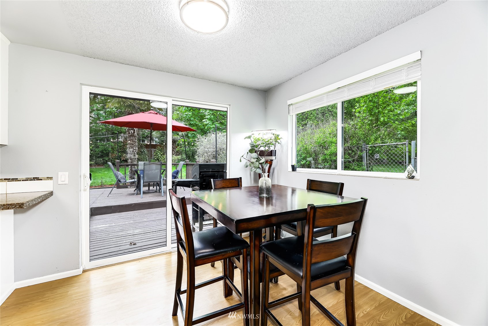17818 Brook Boulevard Bothell, WA 98012 - Photo 8 of 27 a view of a dining room with furniture window and outside view