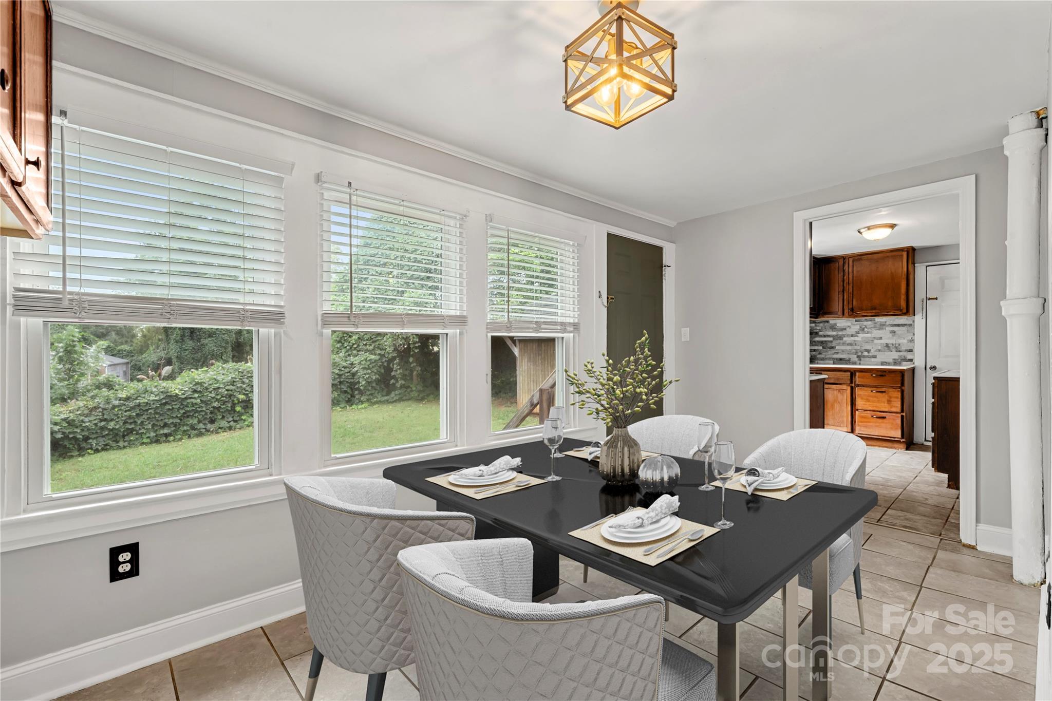 215 West D Street Newton, NC 28658 - Photo 24 of 48 a view of a dining room with furniture window and outside view