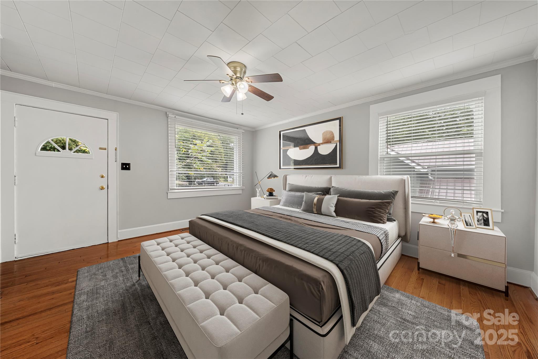 215 West D Street Newton, NC 28658 - Photo 34 of 48 a bedroom with a large bed and a window