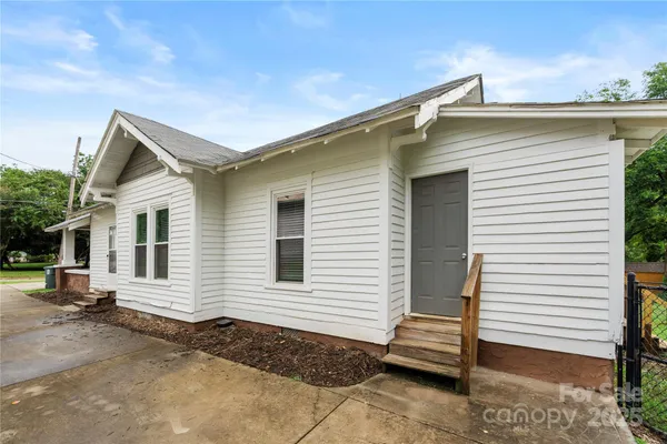 a view of a house with a patio