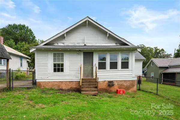 a front view of house with yard