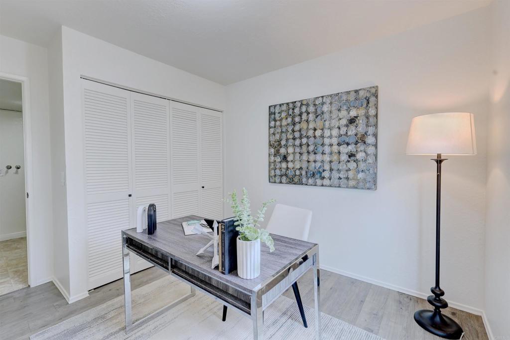 418 3rd Street Encinitas, CA 92024 - Photo 25 of 74 a view of a workspace with furniture and wooden floor