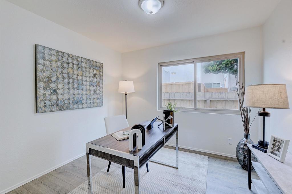 418 3rd Street Encinitas, CA 92024 - Photo 26 of 74 a view of a workspace with furniture and a window