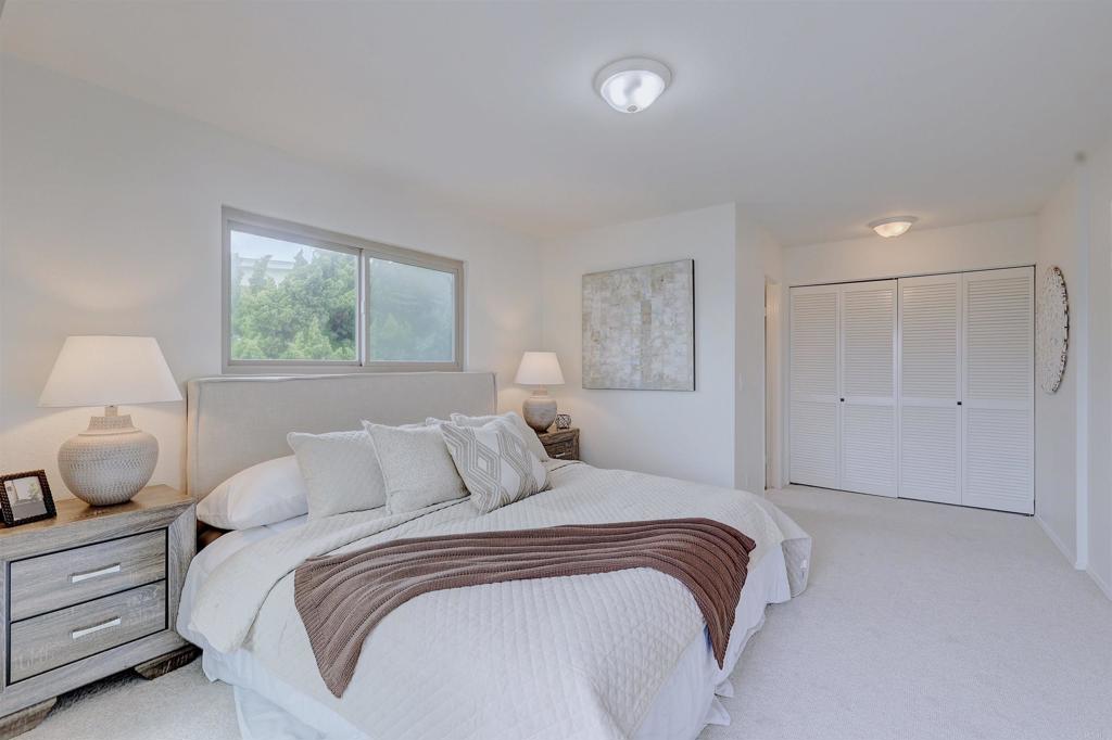 418 3rd Street Encinitas, CA 92024 - Photo 39 of 74 a bedroom with bed and window