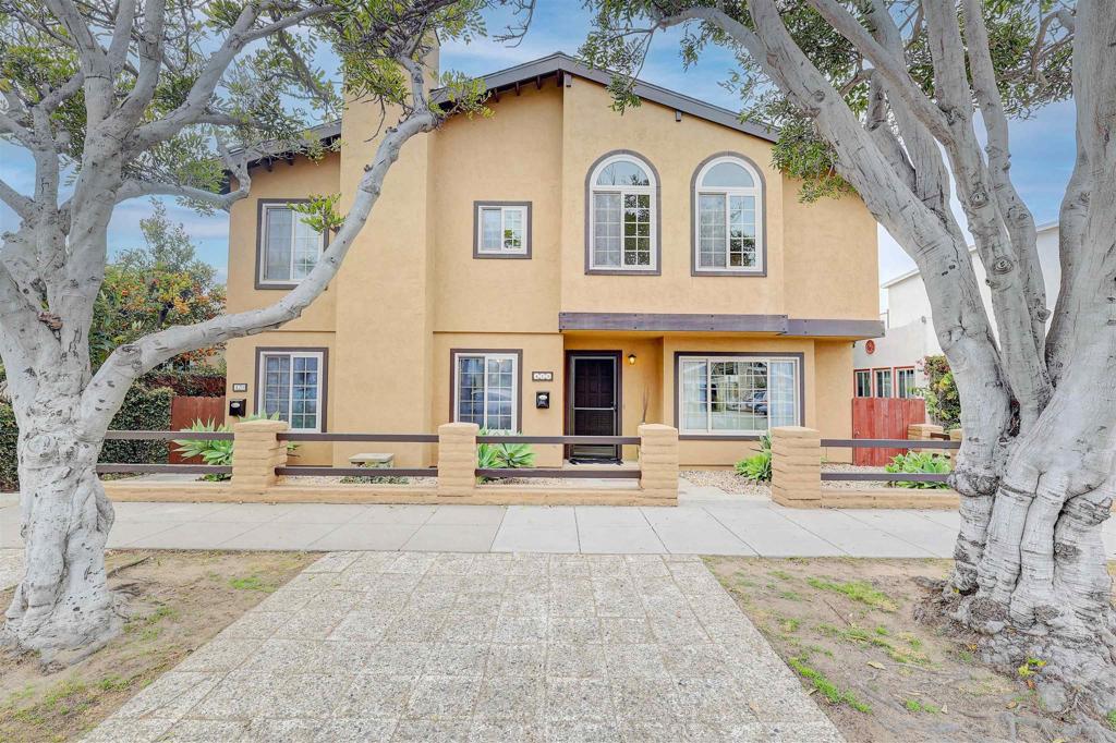 418 3rd Street Encinitas, CA 92024 - Photo 58 of 74 a front view of a house with a yard and trees