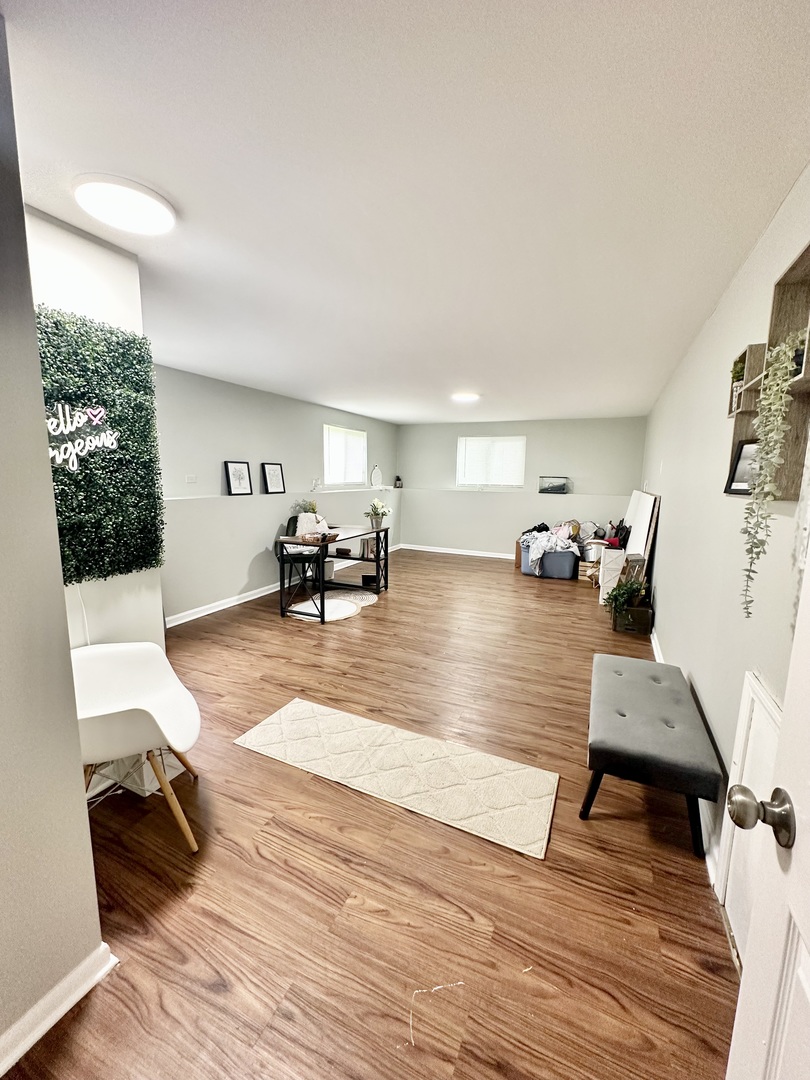 3420 Roesner Drive Markham, IL 60428 - Photo 16 of 21 a living room with furniture and a wooden floor