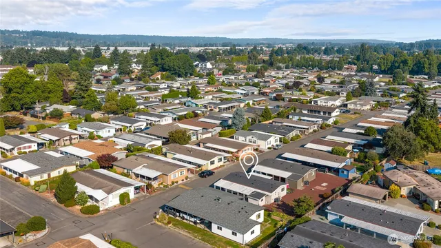 an aerial view of a city with lots of residential buildings