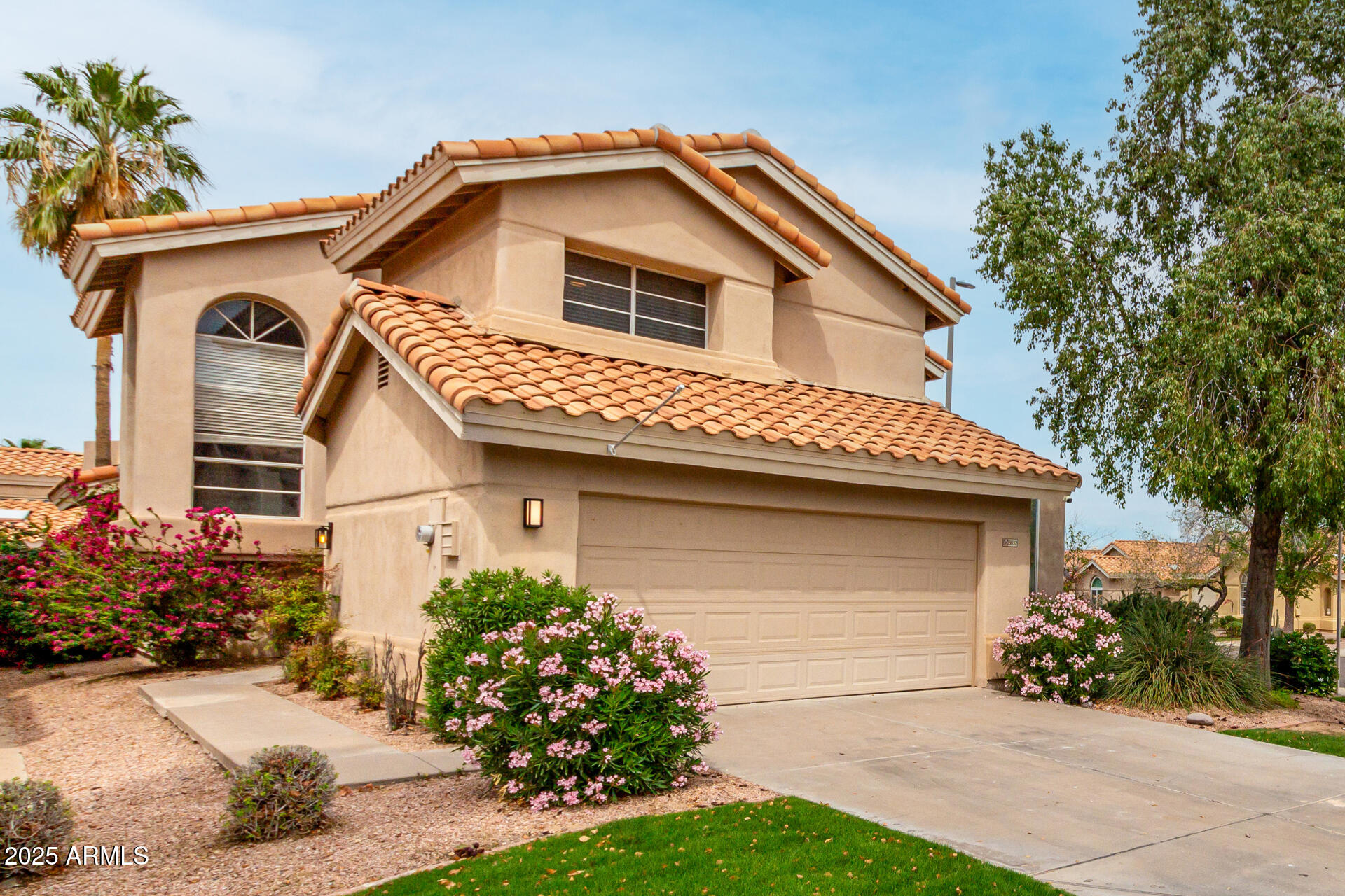 3832 North Gallatin Mesa, AZ 85215 - Photo 1 of 41 a front view of a house with a garden
