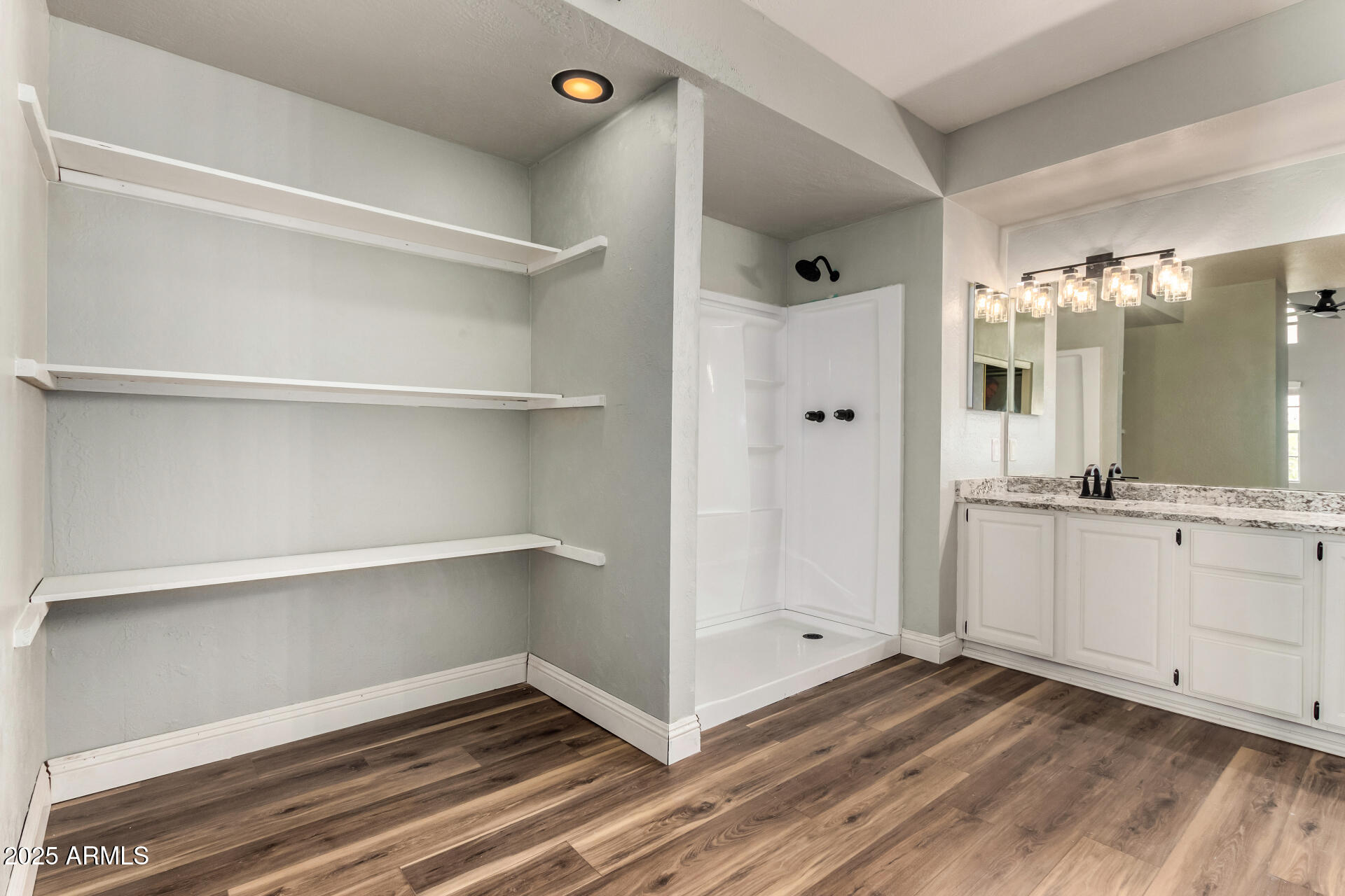 3832 North Gallatin Mesa, AZ 85215 - Photo 27 of 41 a view of a hallway with wooden floor