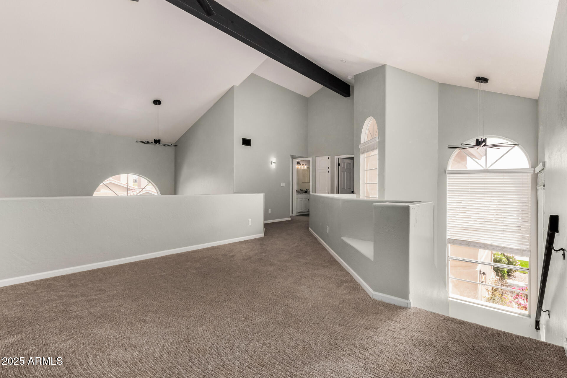 3832 North Gallatin Mesa, AZ 85215 - Photo 29 of 41 a view of a big room with windows and chandelier