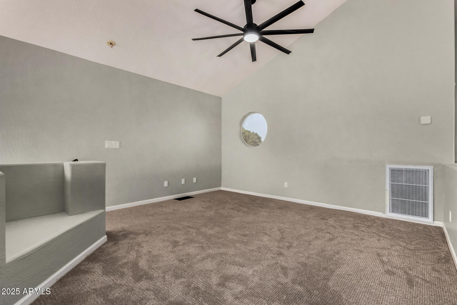 3832 North Gallatin Mesa, AZ 85215 - Photo 30 of 41 a view of an empty room with a window