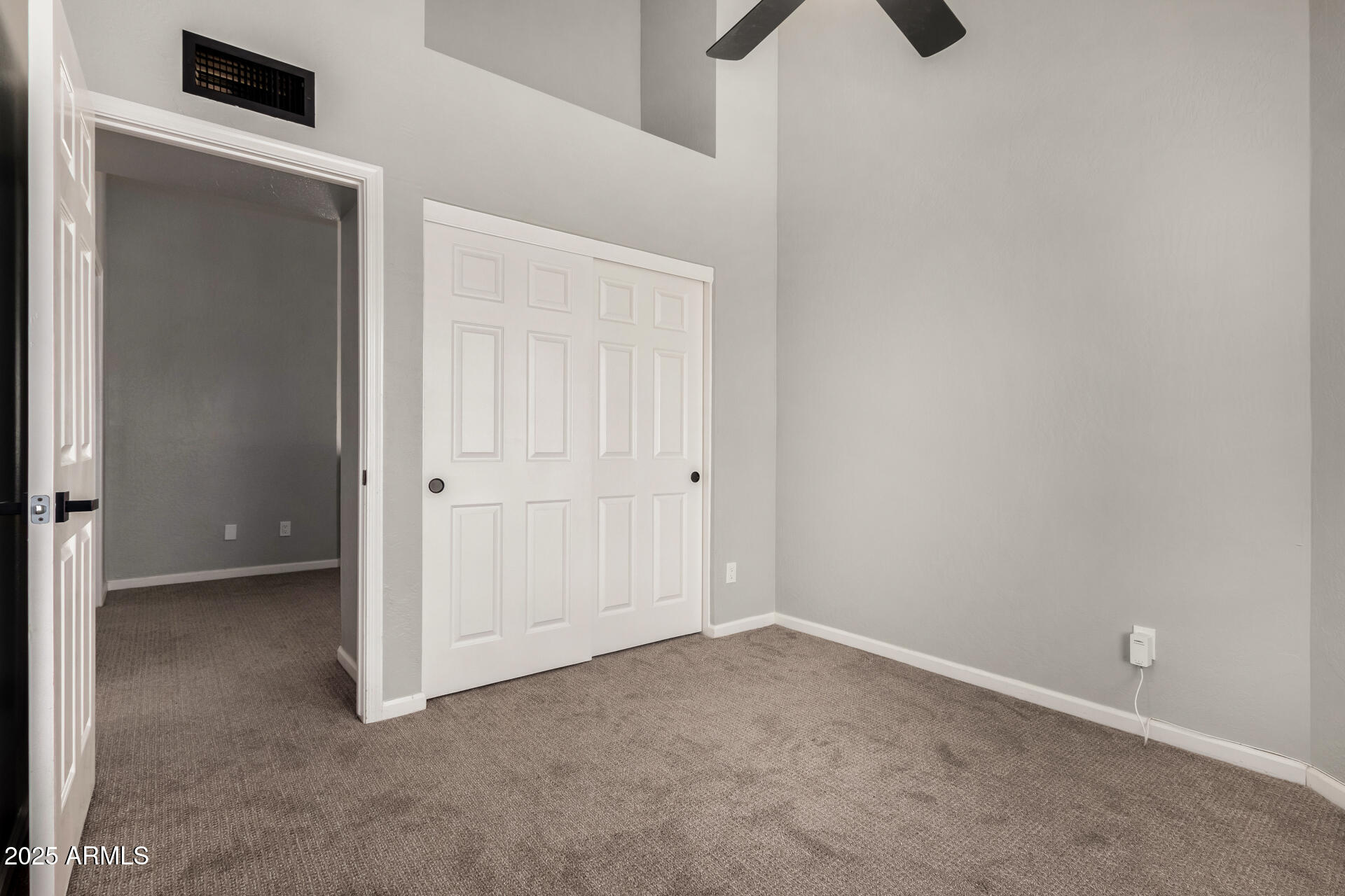 3832 North Gallatin Mesa, AZ 85215 - Photo 34 of 41 an empty room with ceiling fan