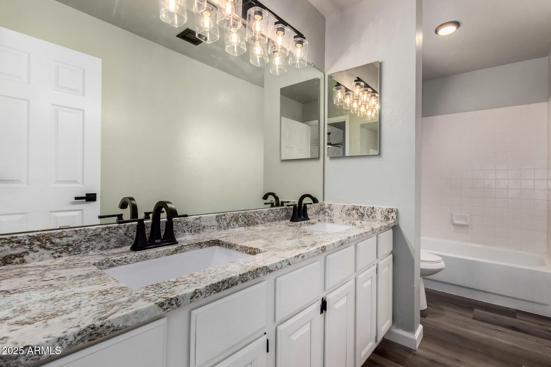 3832 North Gallatin Mesa, AZ 85215 - Photo 35 of 41 a bathroom with a sink and a mirror