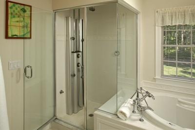 133 Cairn Ridge Road East Falmouth, MA 02536 - Photo 12 of 19 a bathroom with a tub and shower
