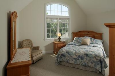 133 Cairn Ridge Road East Falmouth, MA 02536 - Photo 16 of 19 a bedroom with a bed and a window