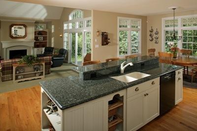 133 Cairn Ridge Road East Falmouth, MA 02536 - Photo 3 of 19 a kitchen with granite countertop a sink a counter top space and living room area