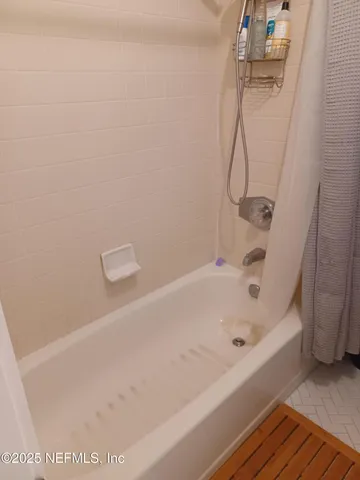 a bathroom with a bathtub