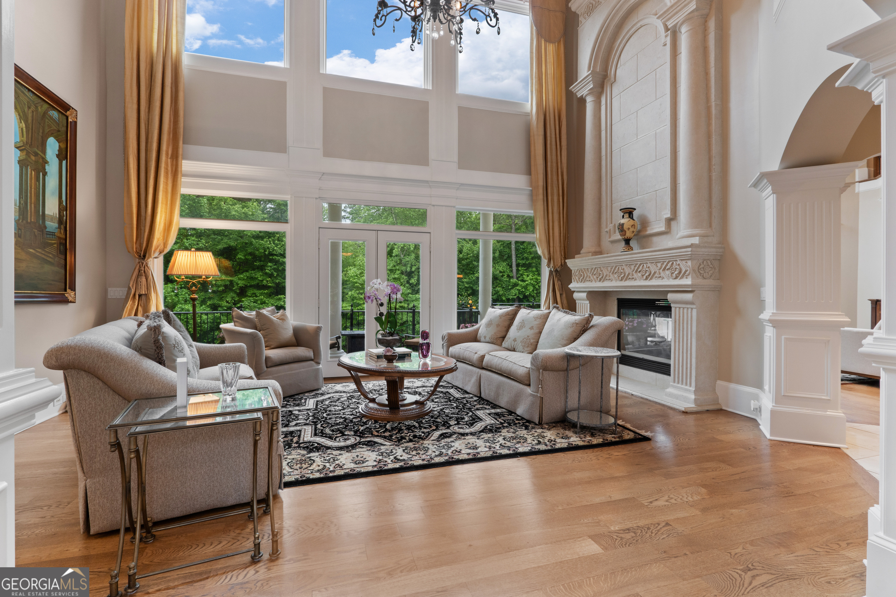 1005 Oak Mountain Road Carrollton, GA 30116 - Photo 13 of 73 a living room with furniture fireplace and a large window