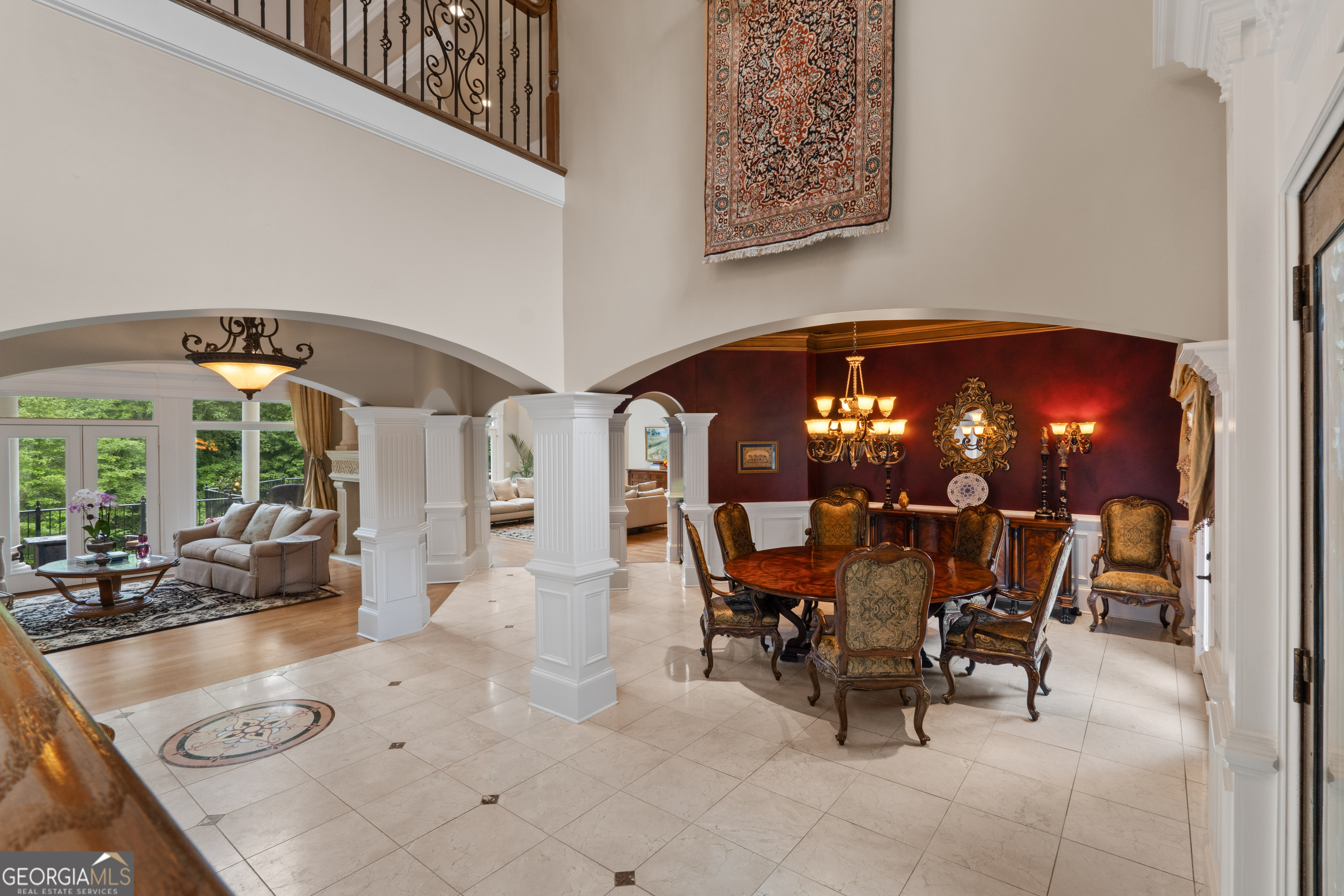 1005 Oak Mountain Road Carrollton, GA 30116 - Photo 10 of 73 a view of a dining room with furniture and chandelier
