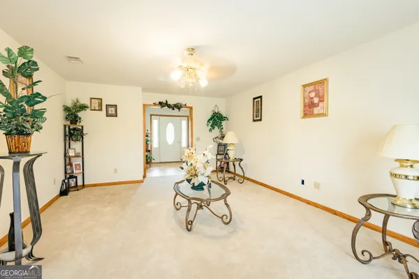 a view of a dining room with furniture window and outside view