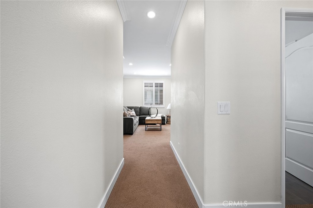 9 Baudin Circle Ladera Ranch, CA 92694 - Photo 20 of 48 a view of a hallway with a couch
