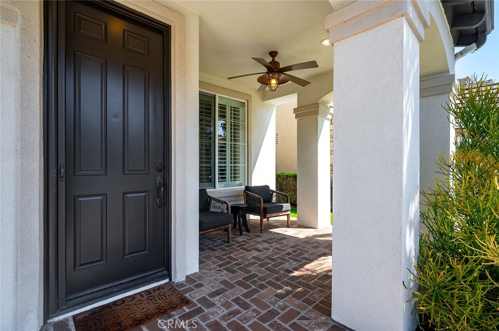 9 Baudin Circle Ladera Ranch, CA 92694 - Photo 2 of 48 a view of a porch with chairs and entryway