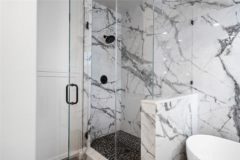 9 Baudin Circle Ladera Ranch, CA 92694 - Photo 25 of 48 a bathroom with a toilet and shower