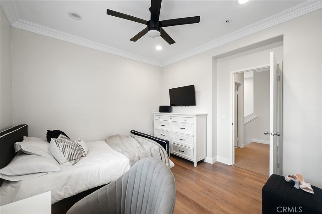 9 Baudin Circle Ladera Ranch, CA 92694 - Photo 26 of 48 a bedroom with a bed and flat screen tv