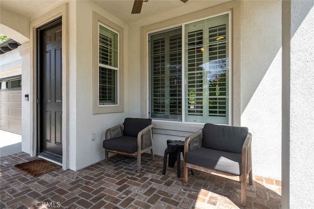 9 Baudin Circle Ladera Ranch, CA 92694 - Photo 3 of 48 a balcony with furniture and a window