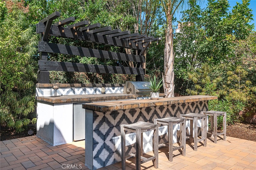 9 Baudin Circle Ladera Ranch, CA 92694 - Photo 39 of 48 a view of wooden deck with a big yard and potted plants