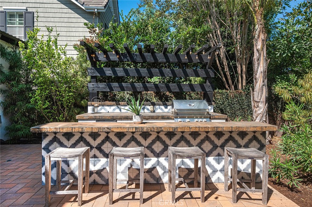 9 Baudin Circle Ladera Ranch, CA 92694 - Photo 40 of 48 a patio with wooden floor and fence