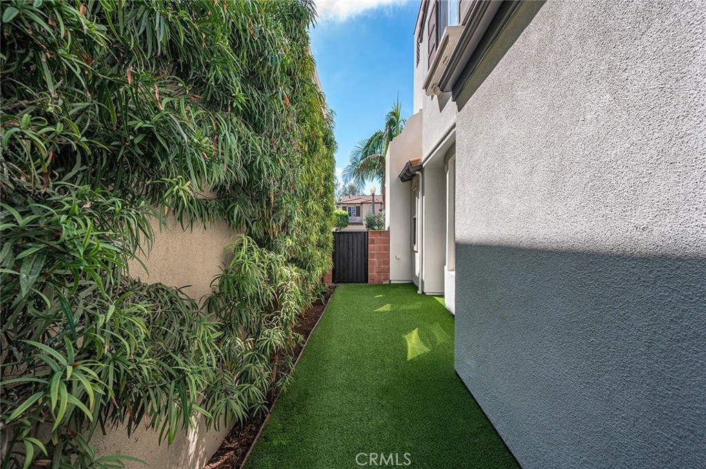 9 Baudin Circle Ladera Ranch, CA 92694 - Photo 42 of 48 a backyard of a house with a garden and outdoor seating