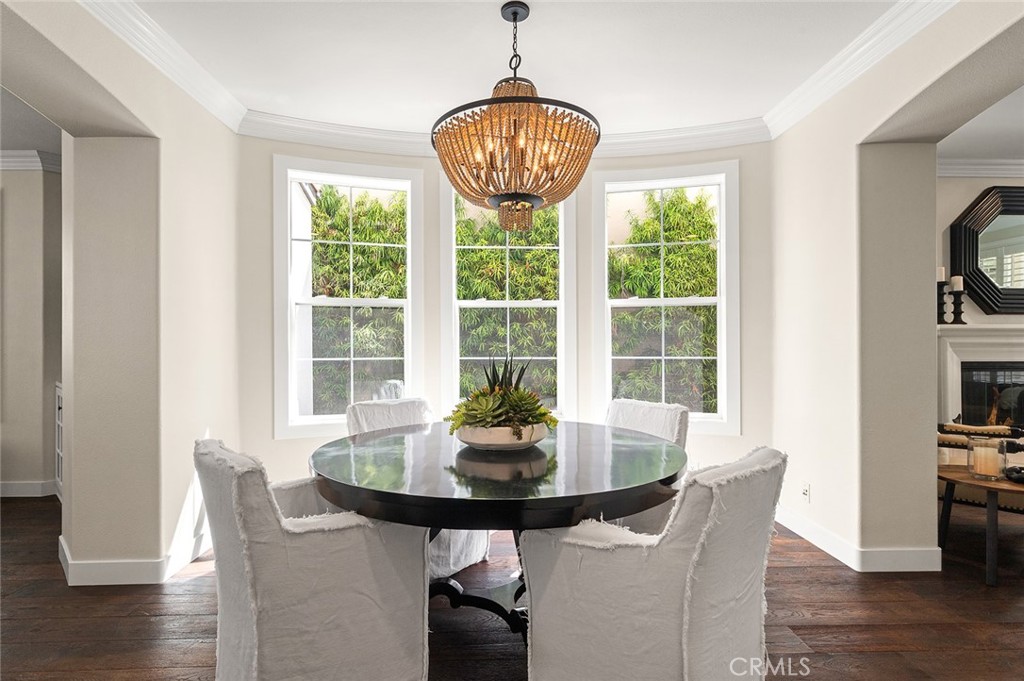 9 Baudin Circle Ladera Ranch, CA 92694 - Photo 8 of 48 a view of a dining room with furniture window and wooden floor