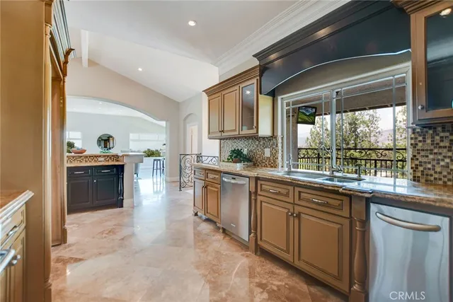 a bathroom with a sink mirror and toilet