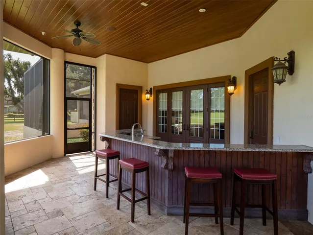a view of a swimming pool with a patio