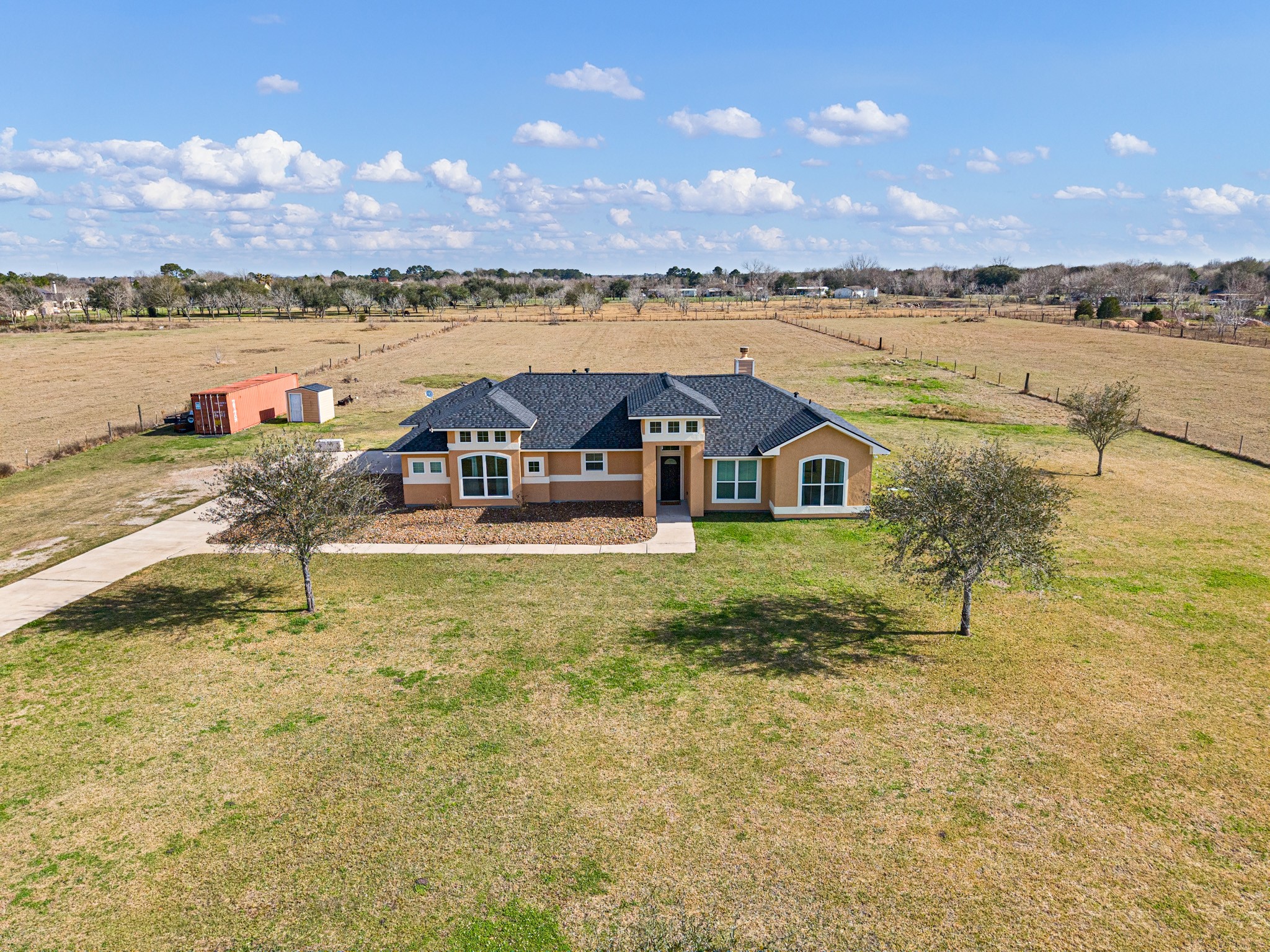 8131 Brinkmeyer Road Needville, TX 77461 - Photo 2 of 34 Beautiful 4 bedroom/2 bathroom single-story home set on a spacious 6.78 acres.