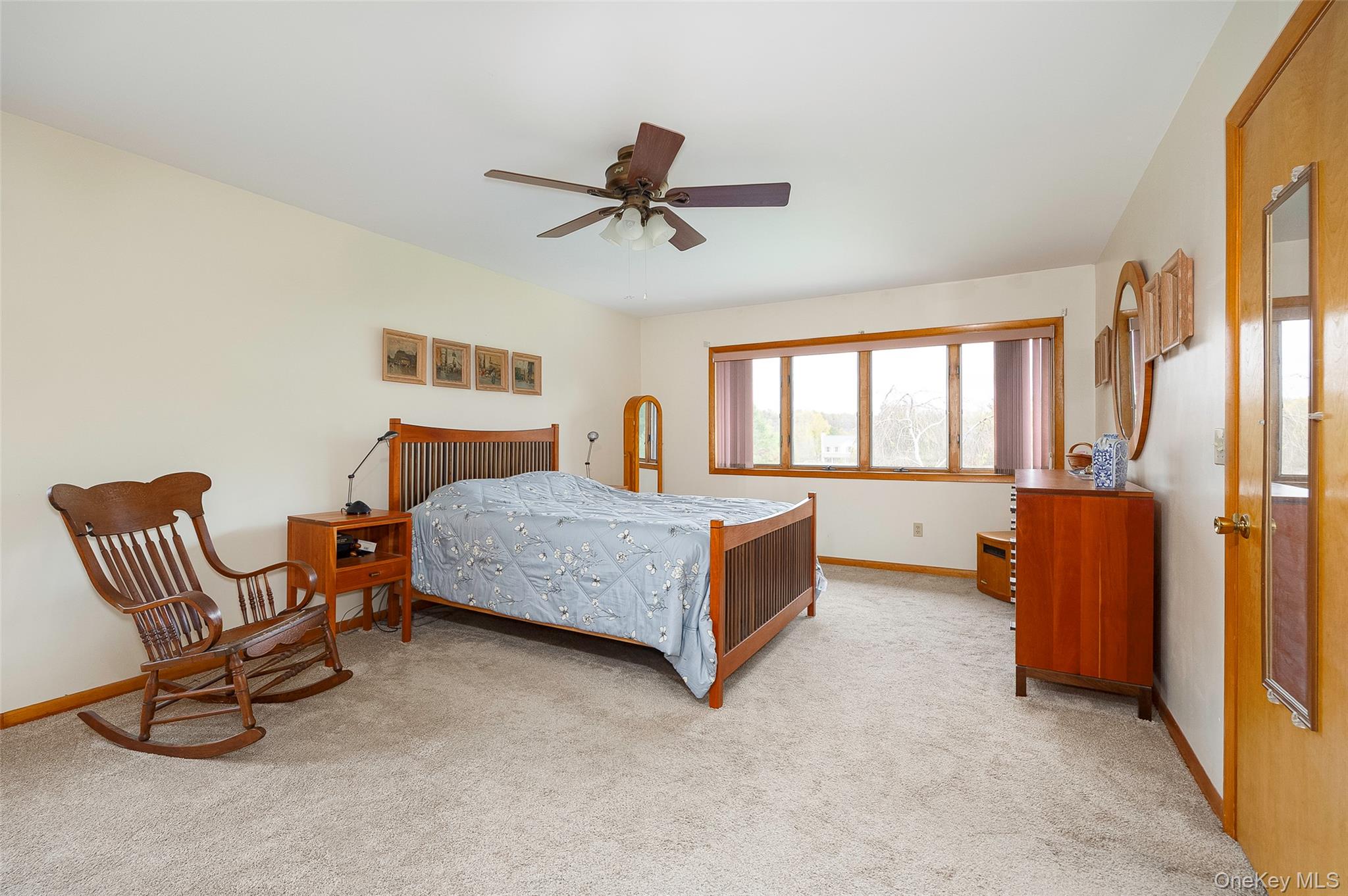 2 English Way Pleasant Valley, NY 12569 - Photo 16 of 32 a bedroom with a bed chair and window