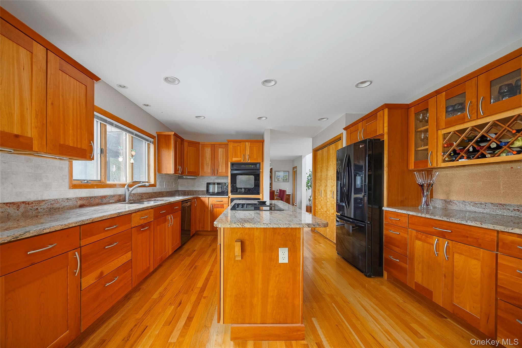 2 English Way Pleasant Valley, NY 12569 - Photo 2 of 32 a large kitchen with stainless steel appliances granite countertop a large window and a refrigerator