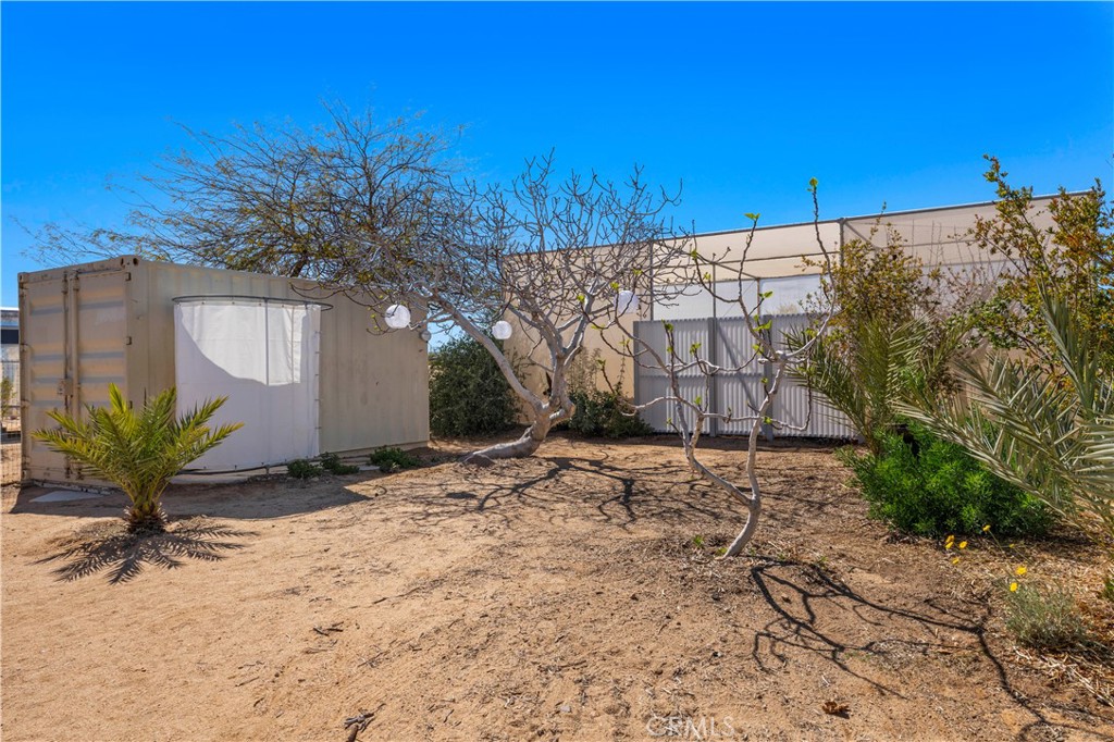 1356 Enchanted Road Joshua Tree, CA 92252 - Photo 34 of 47 a view of a house with a snow in the background