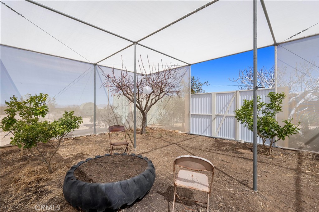 1356 Enchanted Road Joshua Tree, CA 92252 - Photo 37 of 47 a view of a flower pot