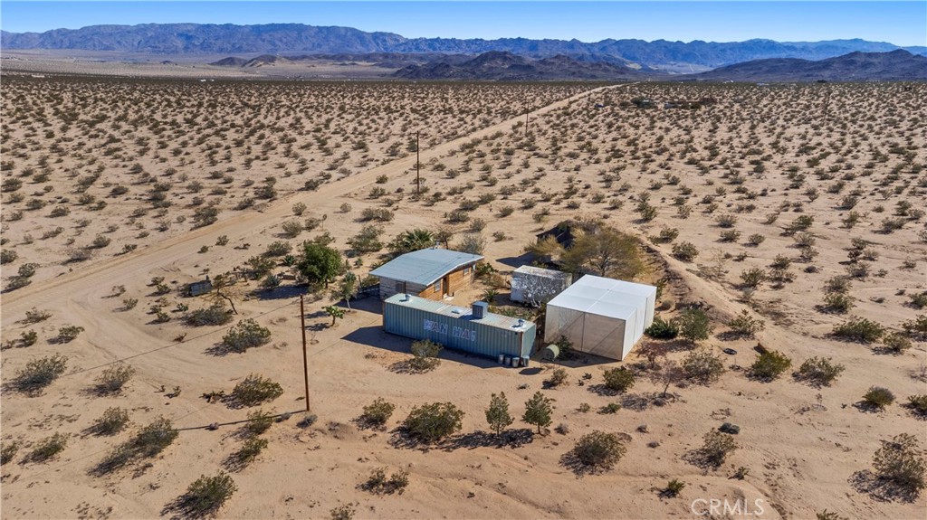 1356 Enchanted Road Joshua Tree, CA 92252 - Photo 44 of 47 a view of a city with a lake