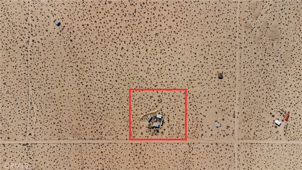 1356 Enchanted Road Joshua Tree, CA 92252 - Photo 47 of 47 a sign on the side of a wall