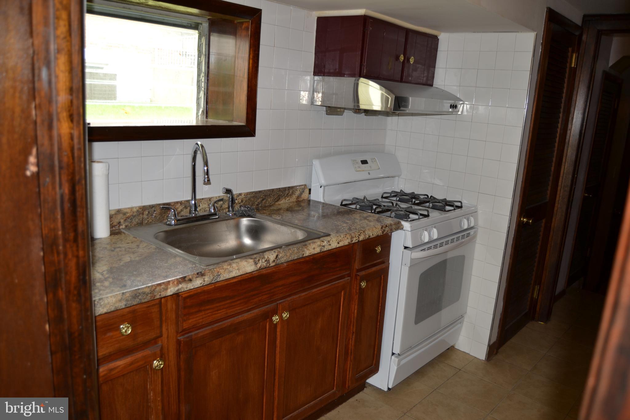 9986 Sandy Road Philadelphia, PA 19115 - Photo 27 of 34 Basement Kitchen