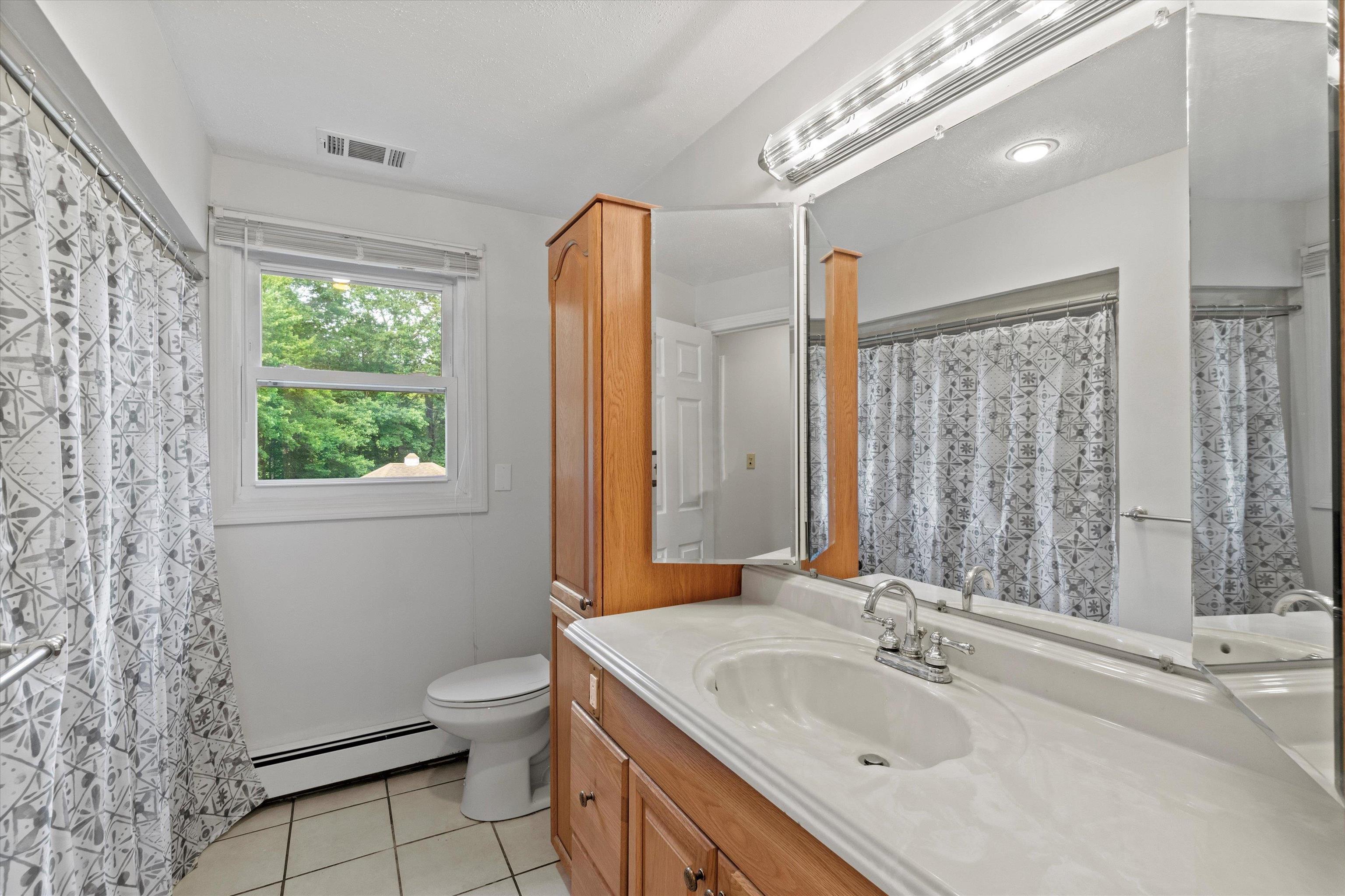 1116 Mammoth Road Pelham, NH 03076 - Photo 19 of 38